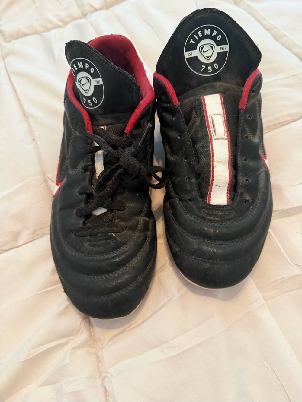 Nike Men’s Black and Red Tiempo 750 Athletic Soccer Shoes